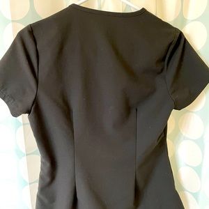 Jaanuu x small 1 pocket tuck on top